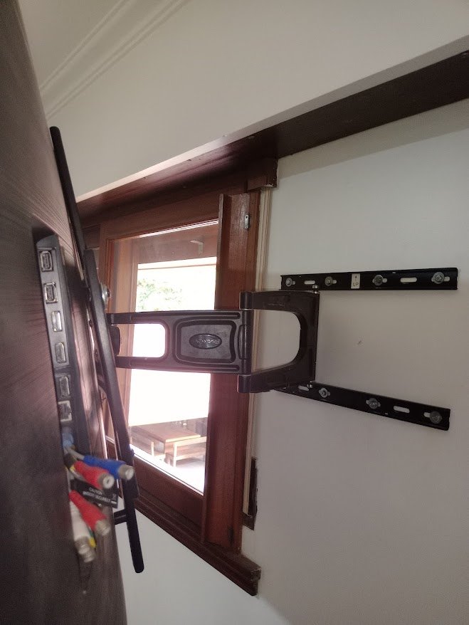 colocacion soporte tv en pared ladrillo